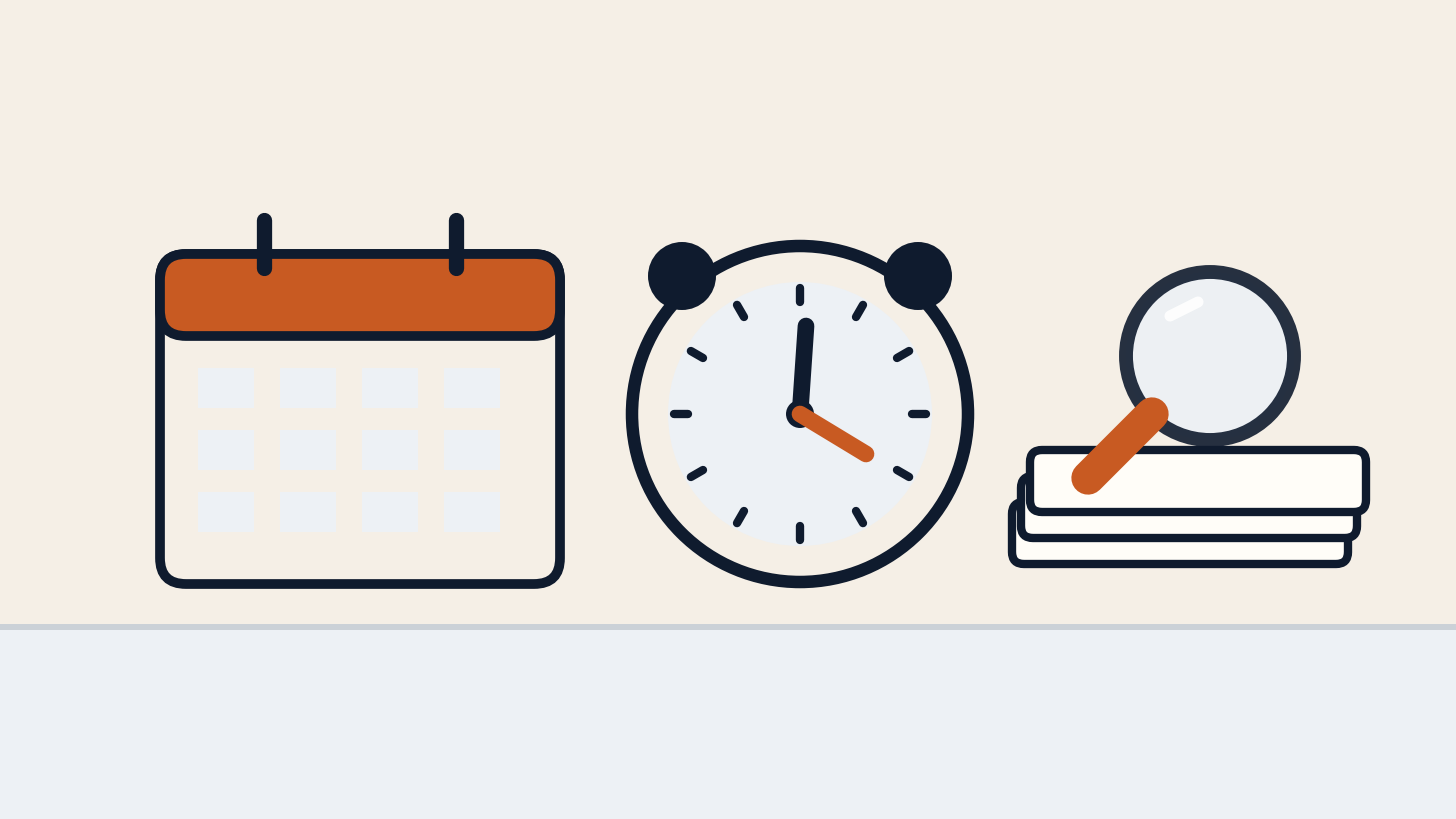A desk calendar, a clock, and a magnifying glass on a stack of papers