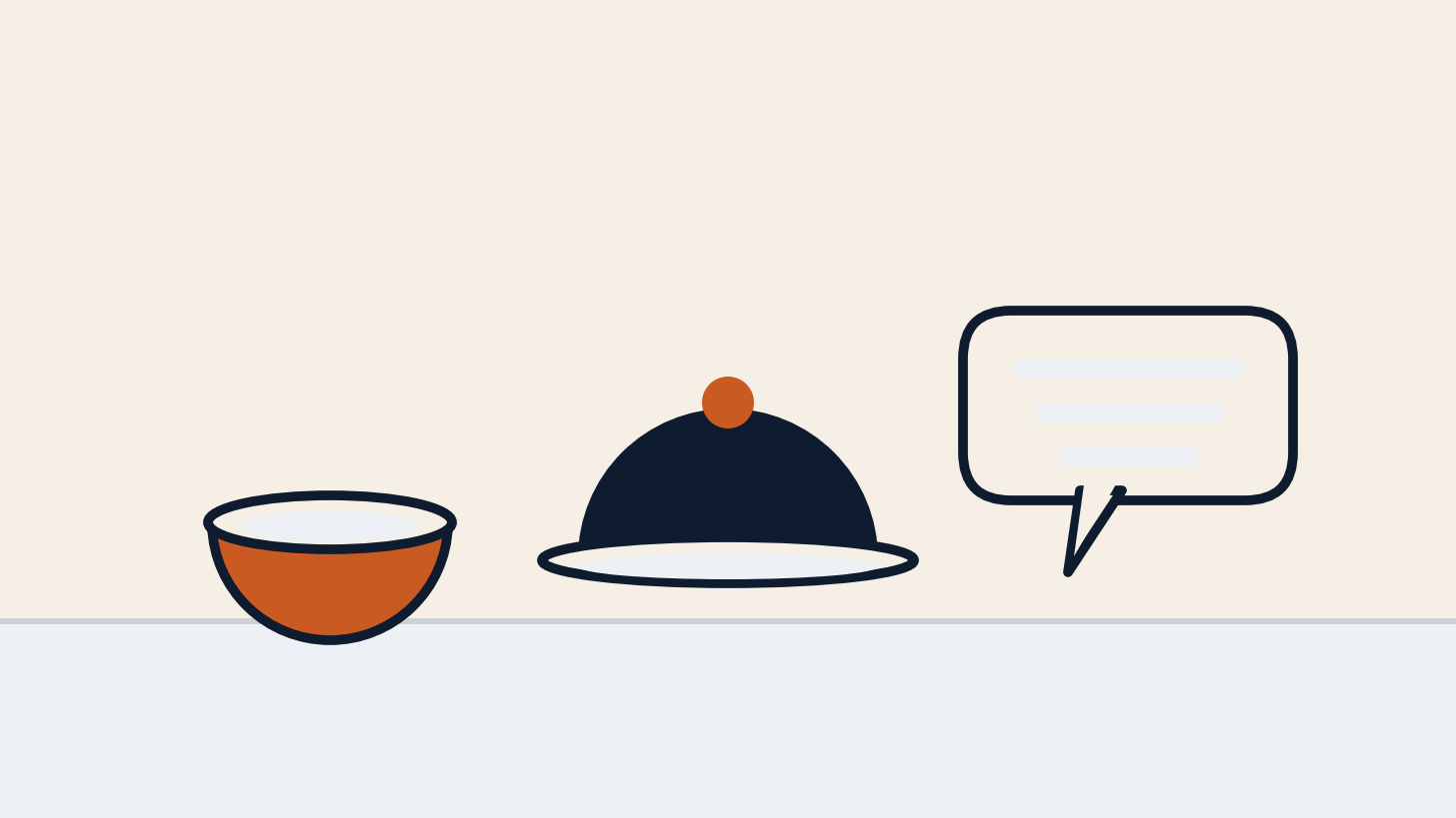 A pet bowl, a covered serving dish, and a speech bubble on a table